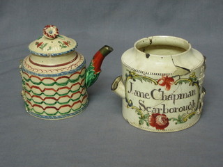 An  18th Century circular Yorkshire style Creamware  teapot with coloured decoration 4" (handle f) together with an 18th Century teapot marked Jane Chapman Scarborough and decorated a 3 masted sailing ship marked The Friendship (heavily f) 4"