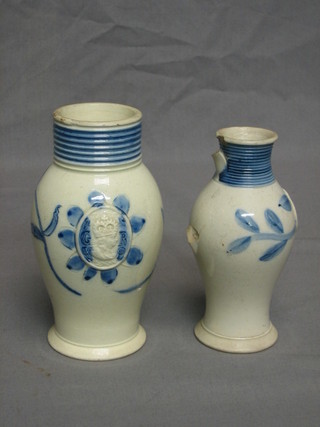 A Georgian salt glazed jug with oval plaque decorated a portrait bust and Royal Cypher GR, with blue floral decoration 6" and 1 other 5 1/2" (handle f)