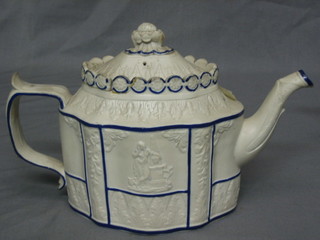 A 19th Century oval white glazed stoneware teapot with sliding lid, with panel decoration to the side depicting classical scenes (chip to spout, f and r)