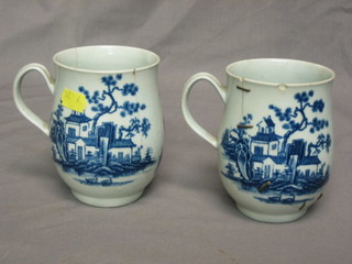 A pair of Worcester style blue and white tankards decorated garden scenes 5" (both cracked)