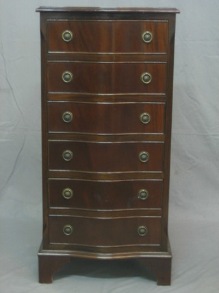 A Georgian style mahogany chest of serpentine outline fitted 6 long drawers, raised on bracket feet 19"