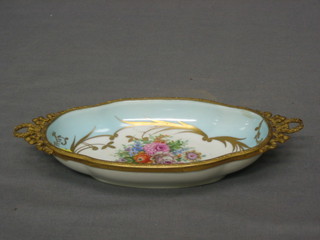 A Limoges porcelain oval twin handled sweet meat dish with gilt metal mounts 6 1/2"