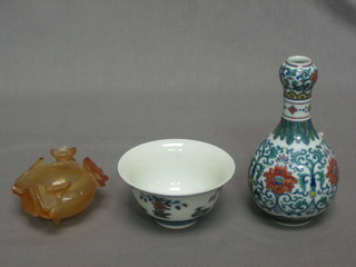 An Oriental club shaped specimen vase, the base with 6 character mark 5", a tea bowl the base with 4 character figure mark 3 1/2" and a circular hardstone pot 2"