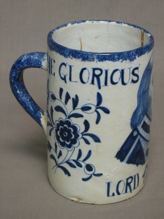 A Delft pottery tankard marked The Glorious 1st of June Lord 1794 Howe, the base with cipher mark A G? (chip to base) 5 1/2"