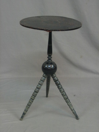 A circular carved Eastern gypsy table 15"