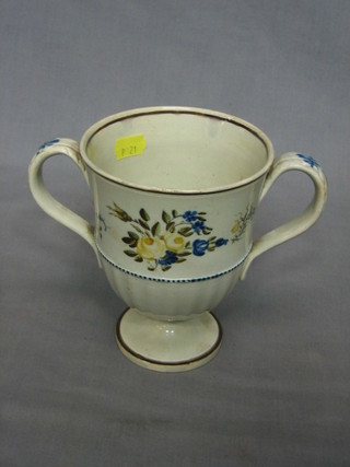 A 19th Century "Pearlware" twin handled cup marked Ratcliff, the base impressed 1880 6"
