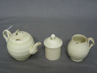 An 18th/19th Century white glazed teapot with strap work handle (chip to rim) 3", a similar tankard 3" and a jar and cover 2"