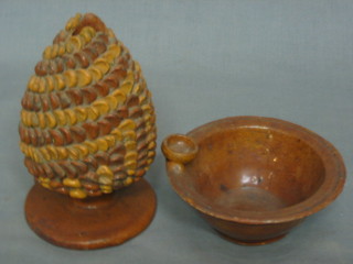 A circular brown glazed pottery bowl 5" and a pottery money box in the form of pineapple 6"