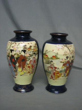 A pair of late Satsuma pottery vases of club form decorated landscape 9"