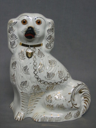 A Staffordshire figure of a seated Spaniel 11"