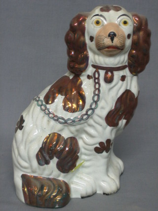 A 19th Century lustre Staffordshire figure in the form of a seated dog 10" (cracked)
