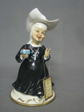 A Capo di Monte figure of a standing Nun 10"
