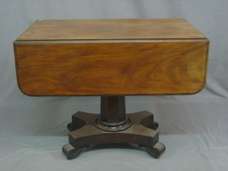 A William IV mahogany pedestal Pembroke table fitted a frieze drawer and raised on chamfered column and tripod base, raised on scrolled feet 36"