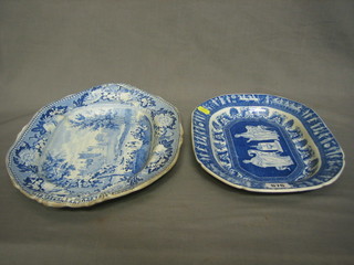 A Staffordshire blue and white twin handled meat plate decoration Lumley Castle Durham 16" (cracked) and a blue and lozenge shaped meat plate decorated a coastal scene 12" (cracked)