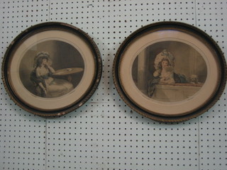 A pair of 18th/19th Century oval coloured prints "Lady with Fan and Seated lady by a Writing Table" 8"