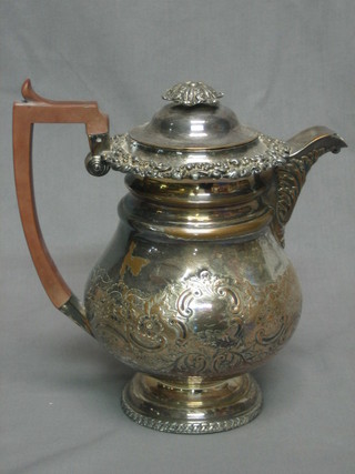 A 19th Century silver plated hotwater jug with gadrooned decoration 8"
