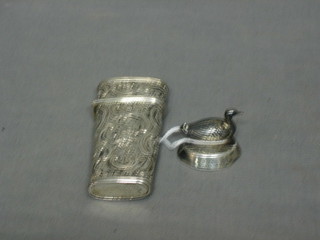 A Continental embossed silver Etui case together with silver menu holder in the form of a duck (2)
