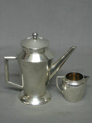 A Victorian 2 piece silver coffee service with coffee pot and cream jug, London 1865 and 1884, 14 ozs