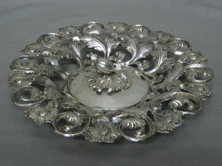 A circular pierced Continental silver basket, decorated a pear, raised on a spreading foot 5 ozs