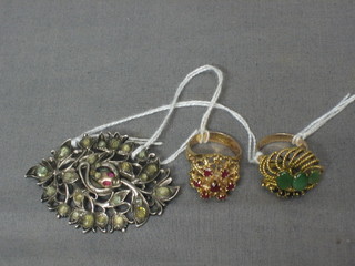 2 lady's gold dress rings and a silver brooch