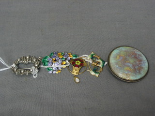 A Ruskin brooch, an Eastern silver brooch and 3 enamelled settings