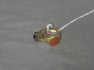 A 9ct gold signet ring set a hardstone and 1 other