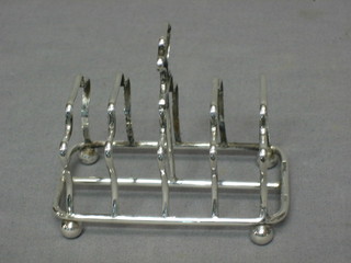 An Edwardian silver 5 bar toast rack, raised on 4 bun feet Birmingham 1902, 2 ozs