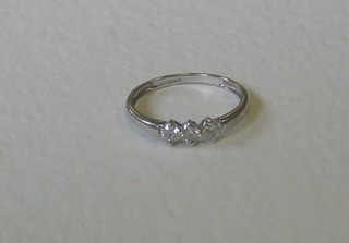 A lady's 18ct white gold dress ring set 3 diamonds