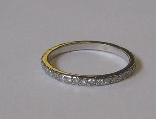 A lady's full diamond set eternity ring, approx 0.46ct