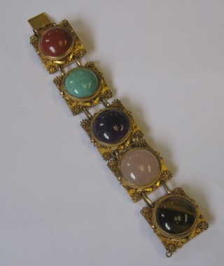 A Victorian silver gilt bracelet set circular cabouchon cut hardstones