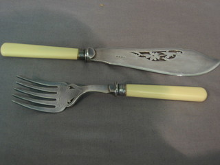 A pair of silver plated fish servers