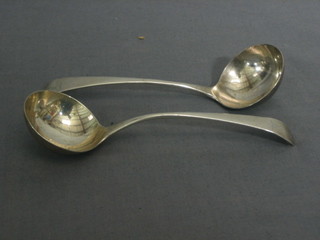 A pair of antique silver bottom marked Old English pattern sauce ladles, 4 ozs