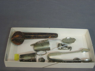 A cigar cutter in the form of a boy sitting on a barrel, 2 miniature silver plated jugs, a pipe with silver band and a mouthpiece and a small collection of curios