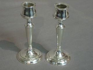 A pair of silver candlesticks 5", Birmingham 1923