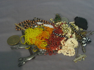 A string of ivory beads and a collection of costume jewellery