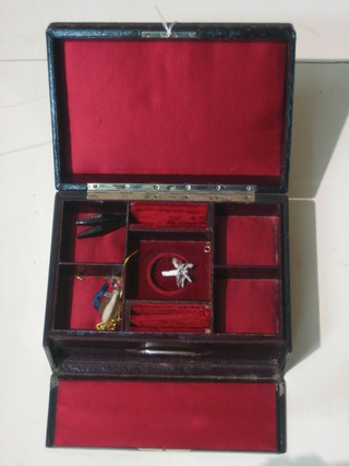 An "Islamic" leather jewellery box with hinged lid 10"