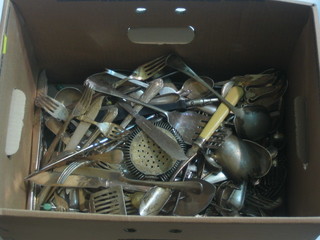 A collection of silver plated flatware