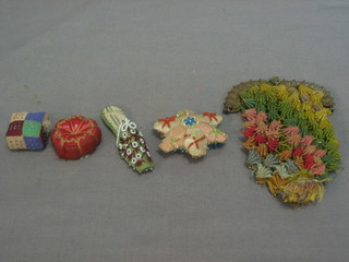 4 various pin cushions and a fabric purse with gilt metal mounts