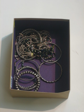 A quantity of silver and other bangles etc