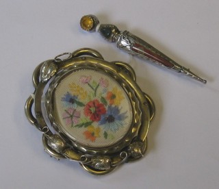 A Victorian "silver" double sided brooch with floral decoration together with a Scotts brooch in the form of a Durk