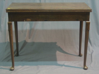 An 18th/19th Century rectangular oak tea table with cantilever action, raised on club supports 36"
