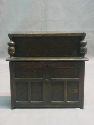A miniature oak court cupboard 9"