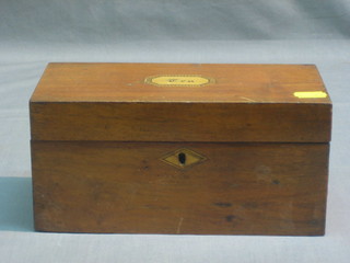 A Victorian rectangular mahogany tea caddy with hinged lid 9"