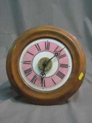 A Postman's alarm clock with puce and white enamelled dial and Roman numerals 10"