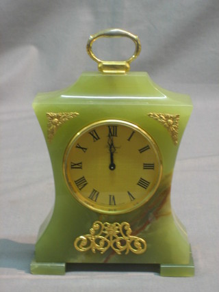 A 1950/60's mantel clock with gilt dial and Roman numerals by Baronet of London, contained in a shaped green onyx case 5"