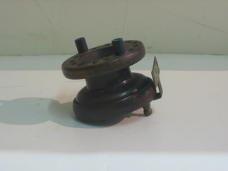 A pierced mahogany and brass centre pin fishing reel 3"