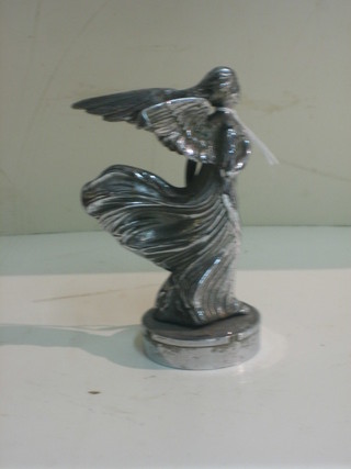 A chromium plated car mascot in the form of a winged lady  5"