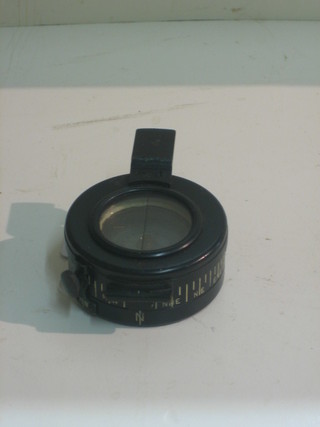 A WWII War Office issue compass by T G & Co Ltd Mk. III