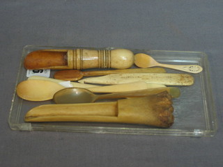 A 19th Century ivory stilton scoop and a bone stilton/marrow scoop and 5 various horn/bone spoons