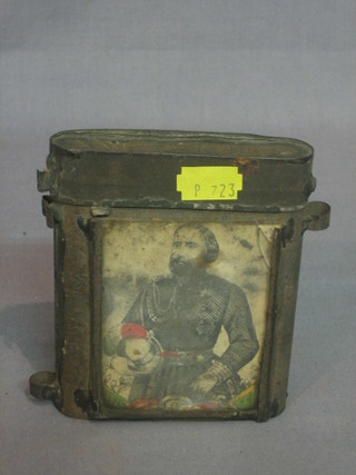 A curious oval canister with monochrome portrait of Giuseppe Garibaldi 4"